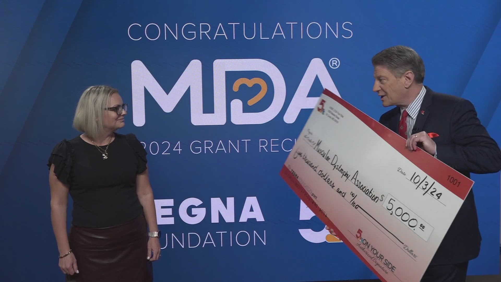 After spending a lifetime accepting checks donated to the Muscular Dystrophy Association, KSDK anchor-reporter Mike Bush got to present that organization with a chec