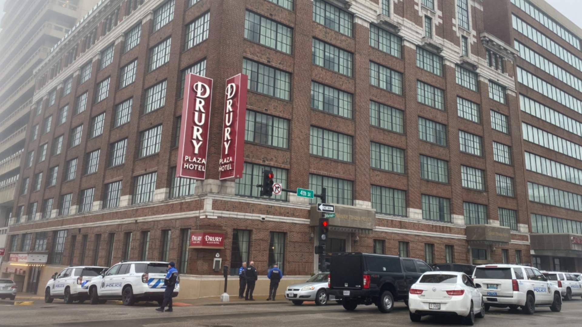 Two children were released from a hostage situation at a downtown St. Louis hotel room. A woman remains held against her will Wednesday morning.