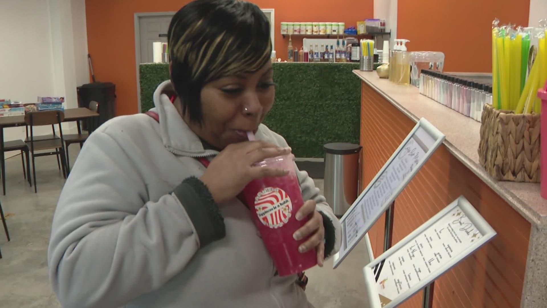 Ferguson's economy is booming thanks to small businesses. Juanita Thompson opened Yummie Nutrition in January.
