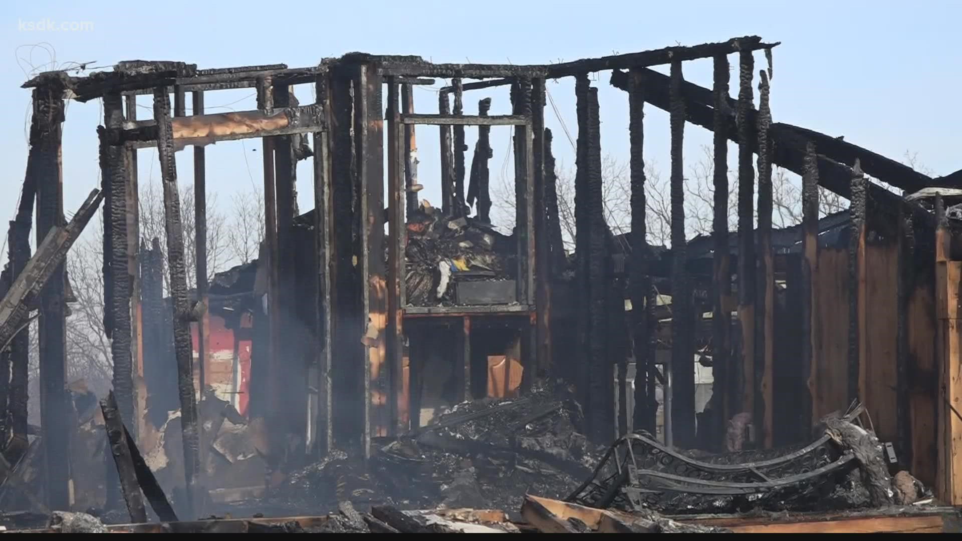 Two Winfield-Foley firefighters had a close call on the scene of a house fire on Highway Y in Lincoln County Tuesday morning.