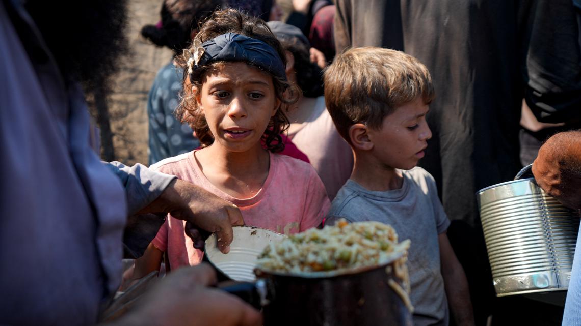 Sealed off from aid by Israeli siege, Gazans search for food | ksdk.com