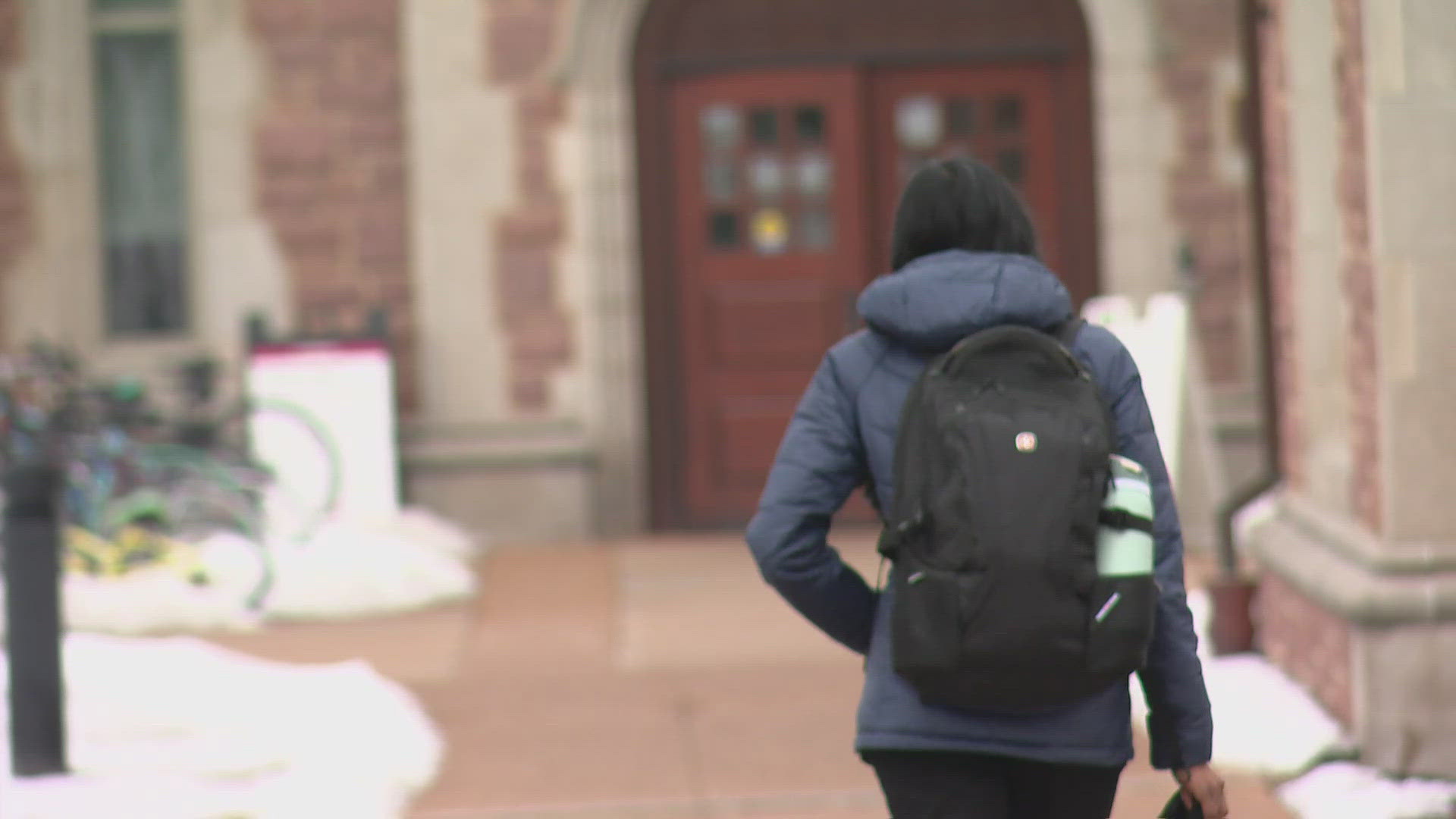 Man accused of hiding in women's restroom at WashU library, secretly