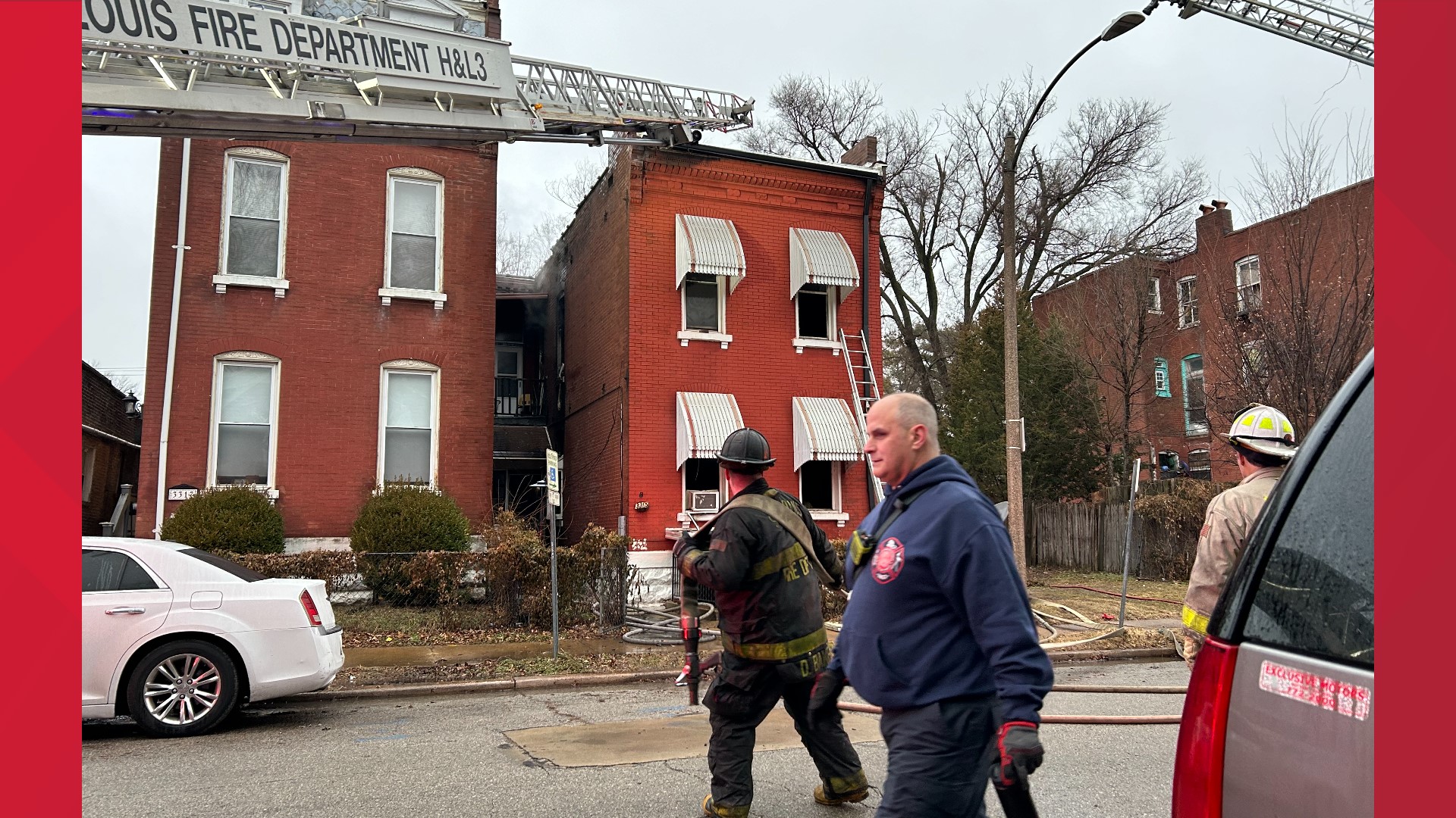 A fully involved back porch on a 2 story brick.