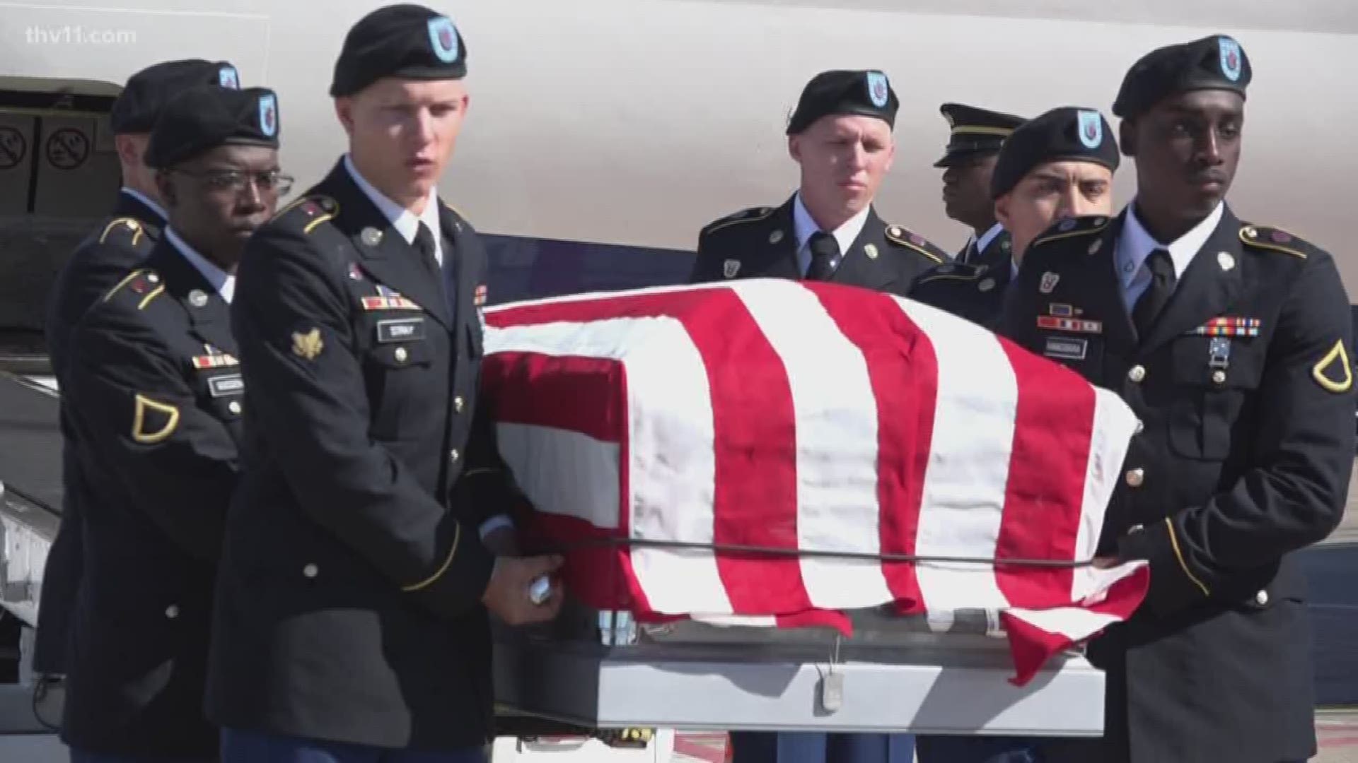 The familiar black flags for POW's and those missing in action all say "You are not forgotten." An Arkansas family felt the meaning of that today.