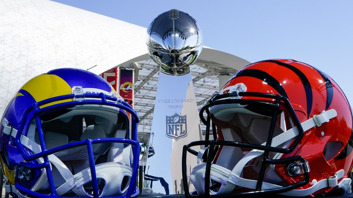 Inglewood, USA. 09th Feb, 2022. The helmets of Super Bowl participants Los  Angeles Rams (l) and Cinncinati Bengals stand on a table in front of the  Vince Lombardy Trophy, which the winner