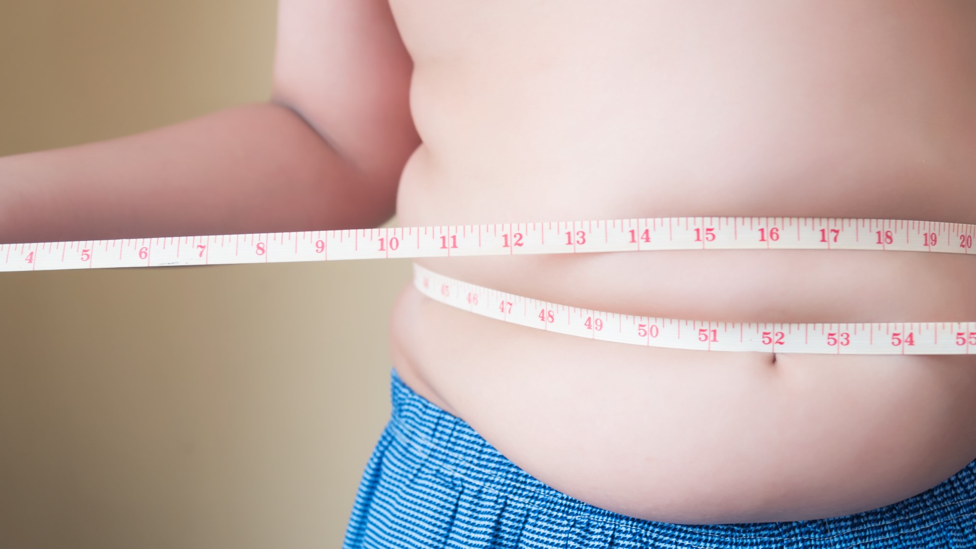 Body image issues are starting earlier in kids. Here's how parents can help promote a healthy body image at home.