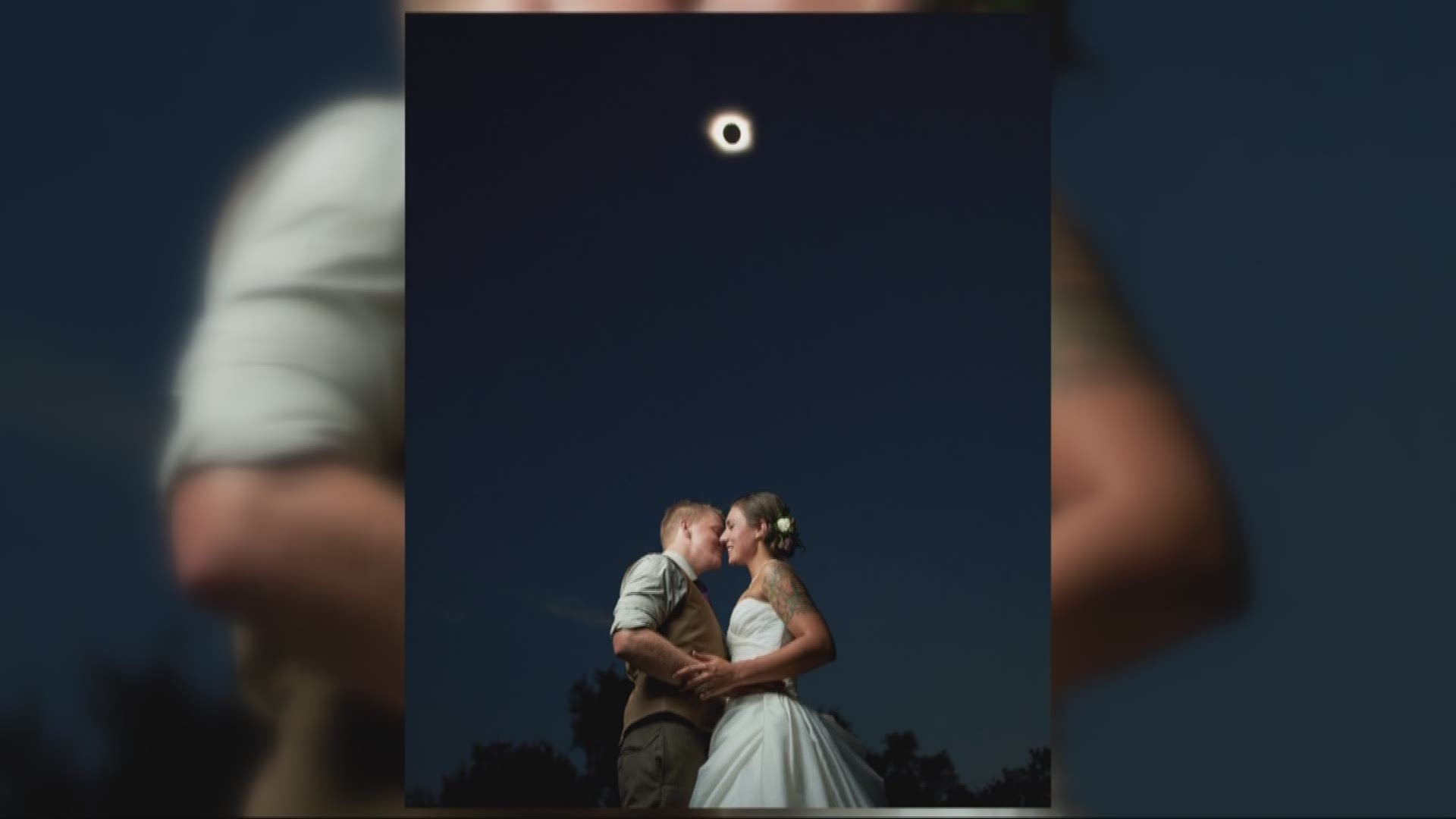 Two military service members were able to time their photo just right and get hitched under the great American eclipse.