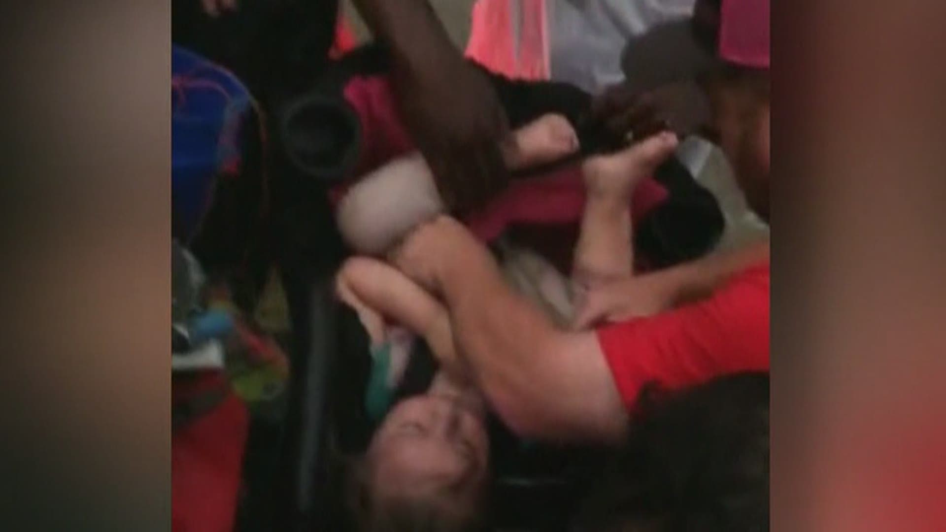 Family stuck in flooded truck meets hero who saved babys life