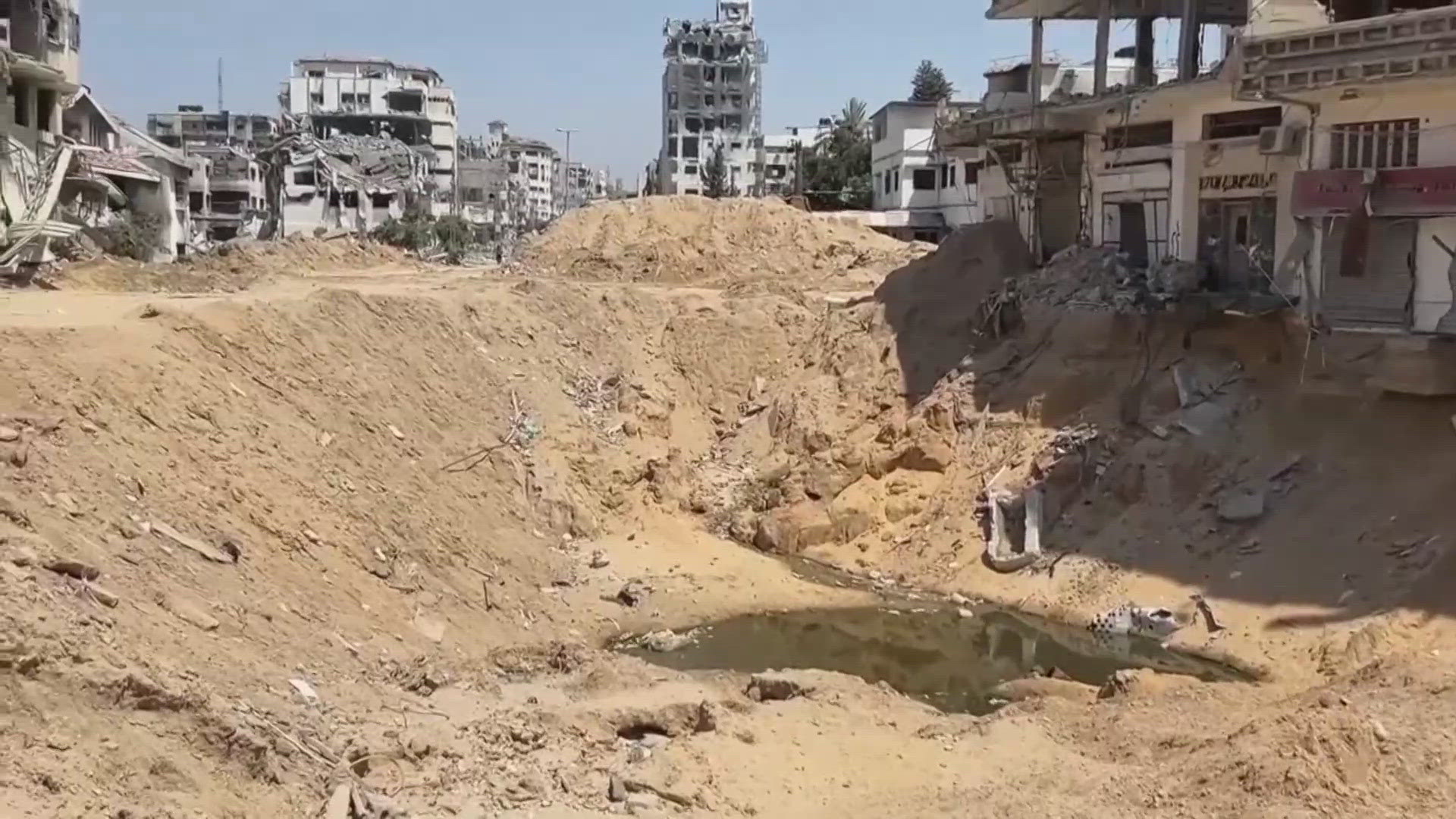 Gaza officials say 60 bodies have been found so far, including families.