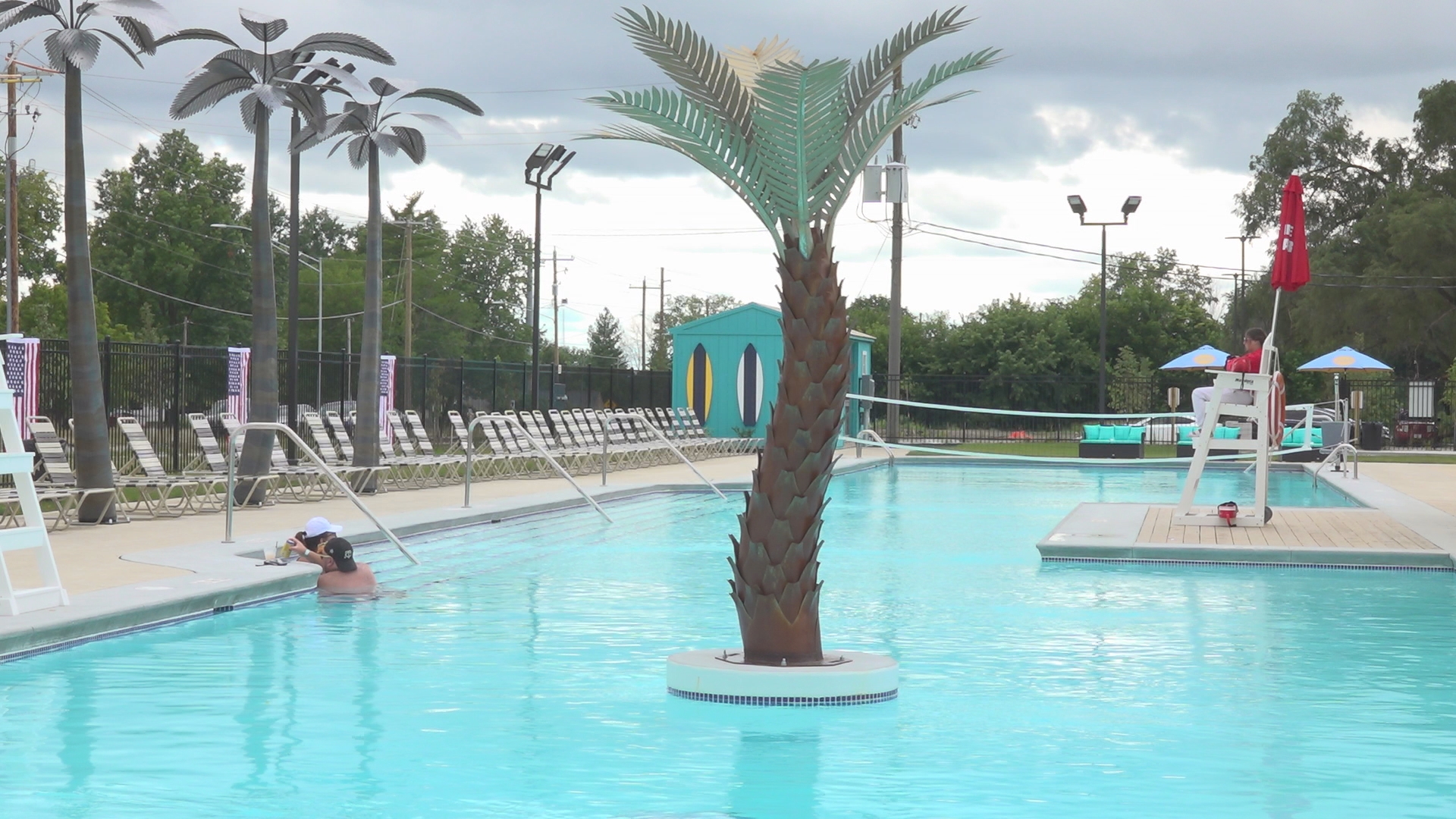 The club includes two bars, a snack stand, plenty of yard games and a swimming pool with a volleyball net.