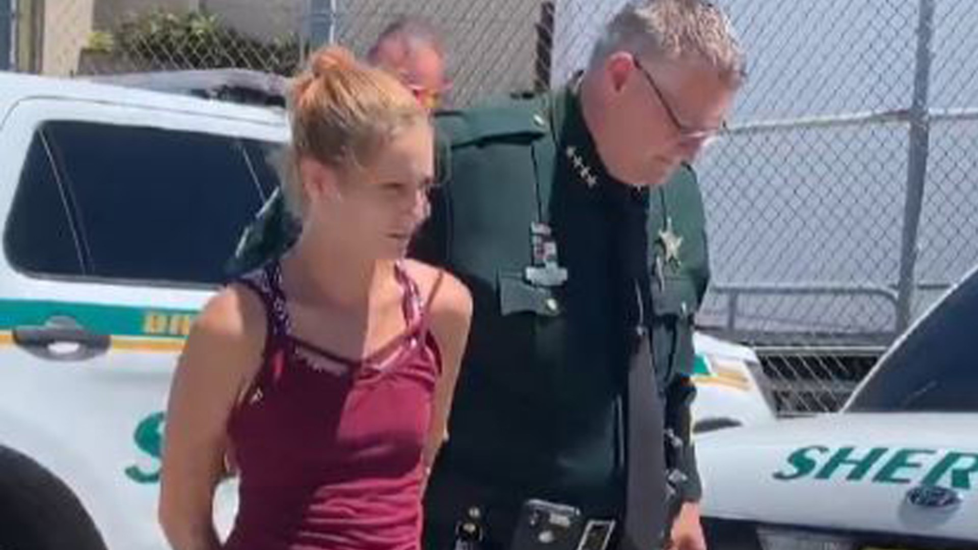 Brevard County woman shoves dog into trunk in video | ksdk.com