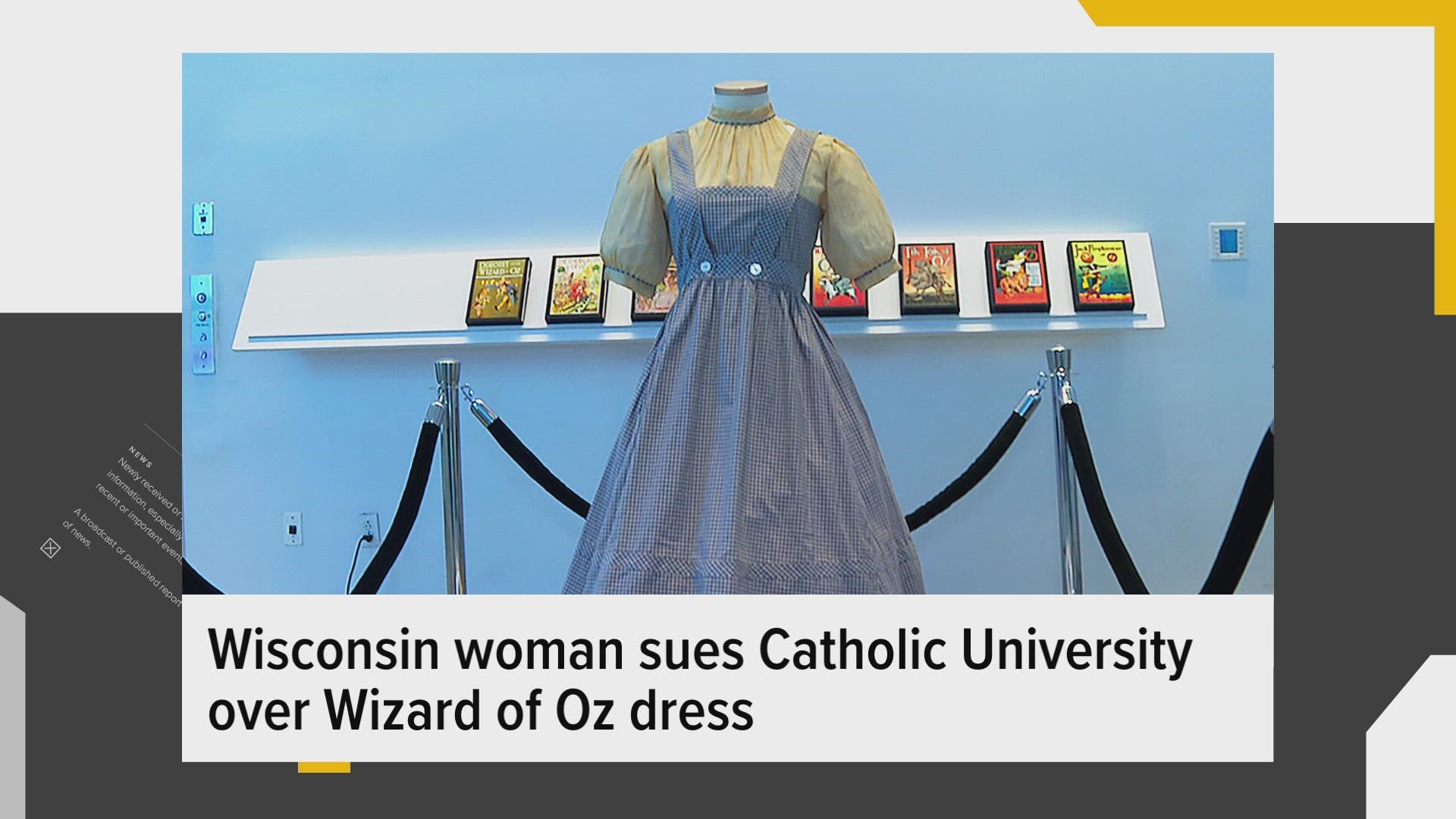 The Catholic University of America is planning to auction off a dress worn by Judy Garland in the Wizard of Oz but a woman is claiming it's hers. It was found at CUA