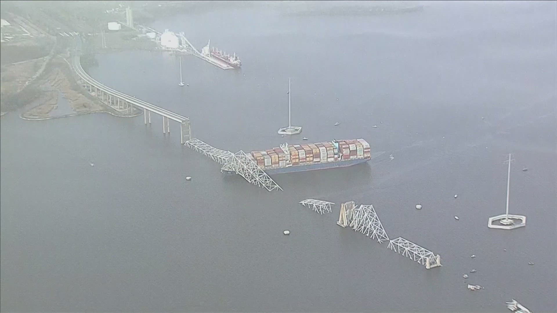 A container ship rammed into a major bridge in Baltimore early Tuesday, causing it to snap and plunge into the river below. Several vehicles fell into the water.