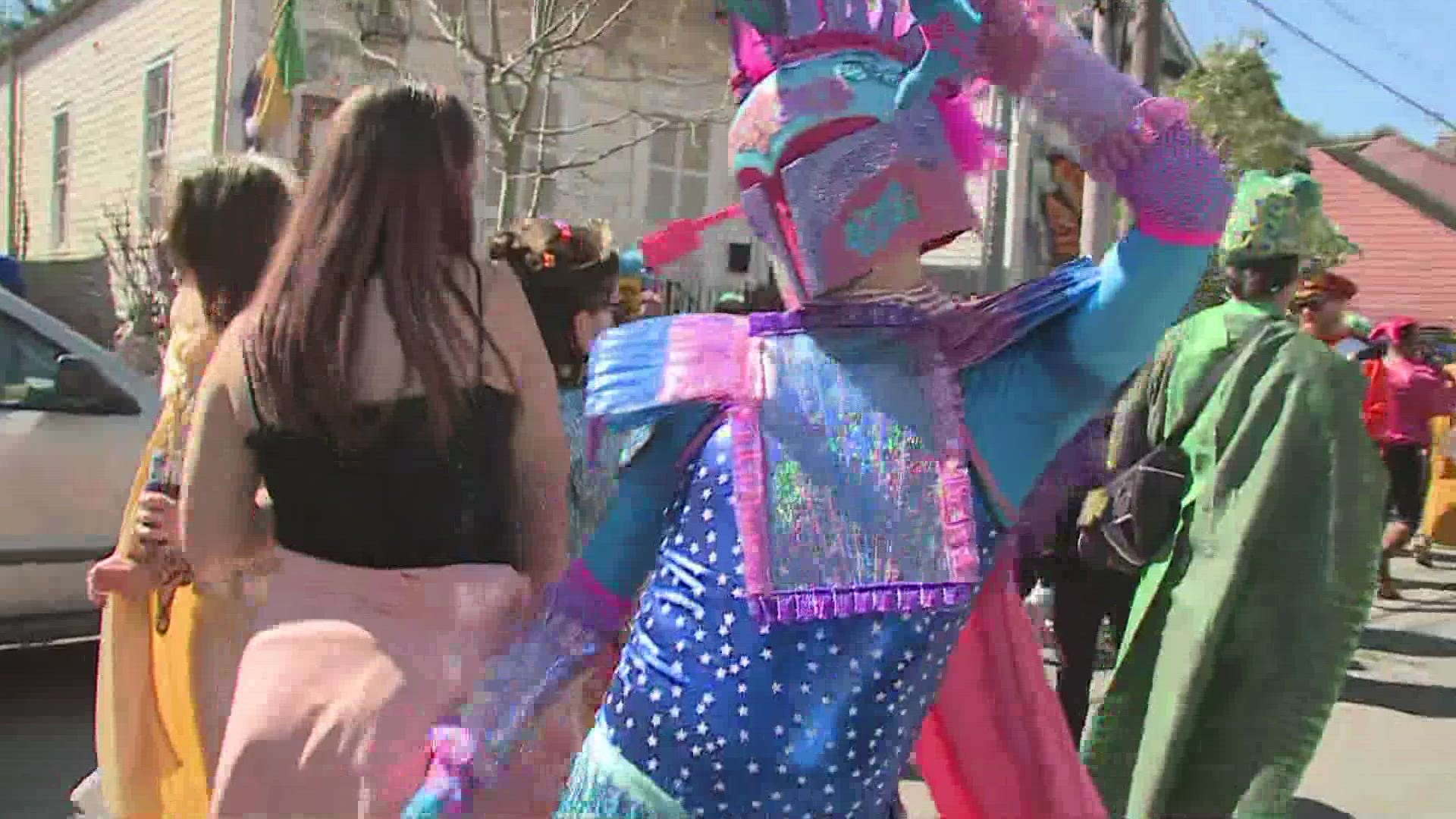 Handmade floats roll through the Marigny