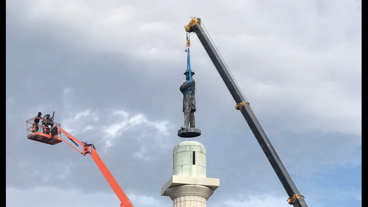 After long fight, iconic Lee Circle statue comes down