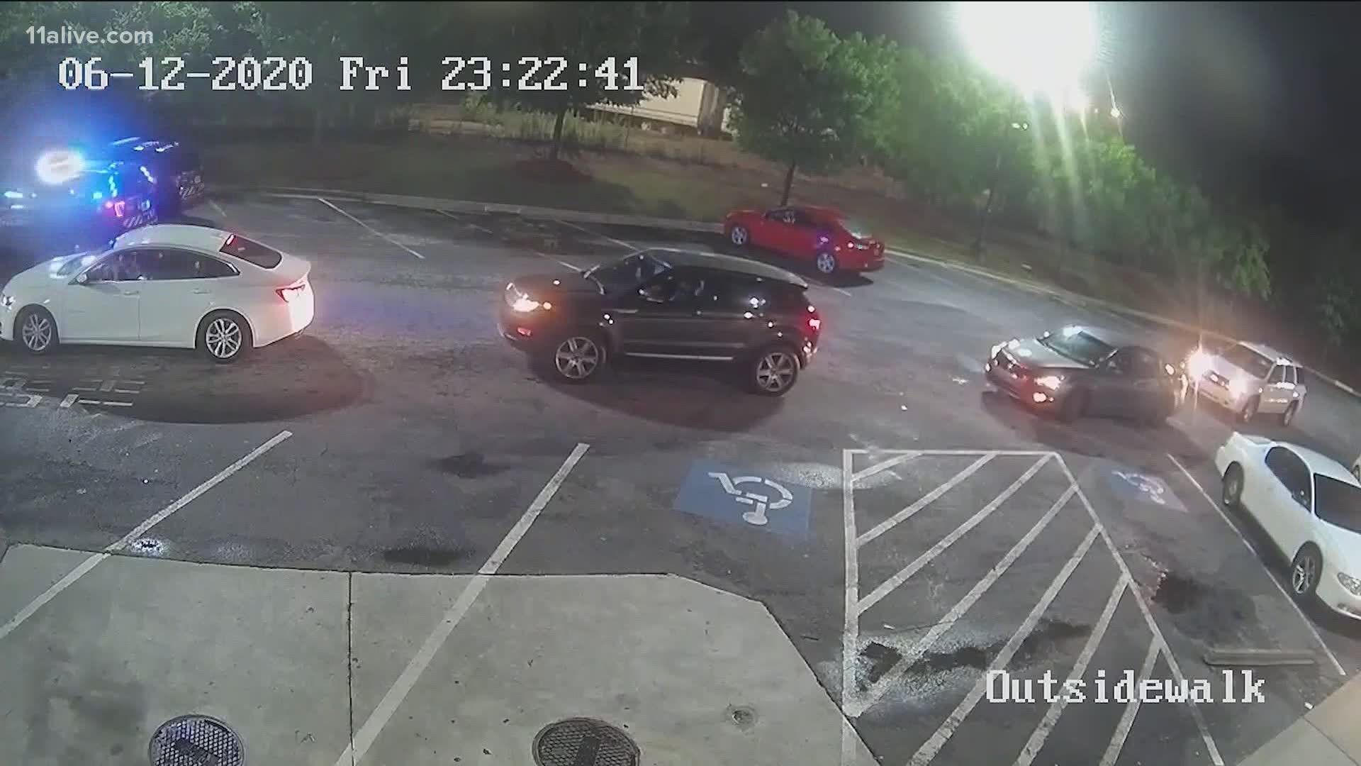 Surveillance video shows from the Wendy's on University Ave. in Atlanta shows the shooting of Rayshard Brooks.