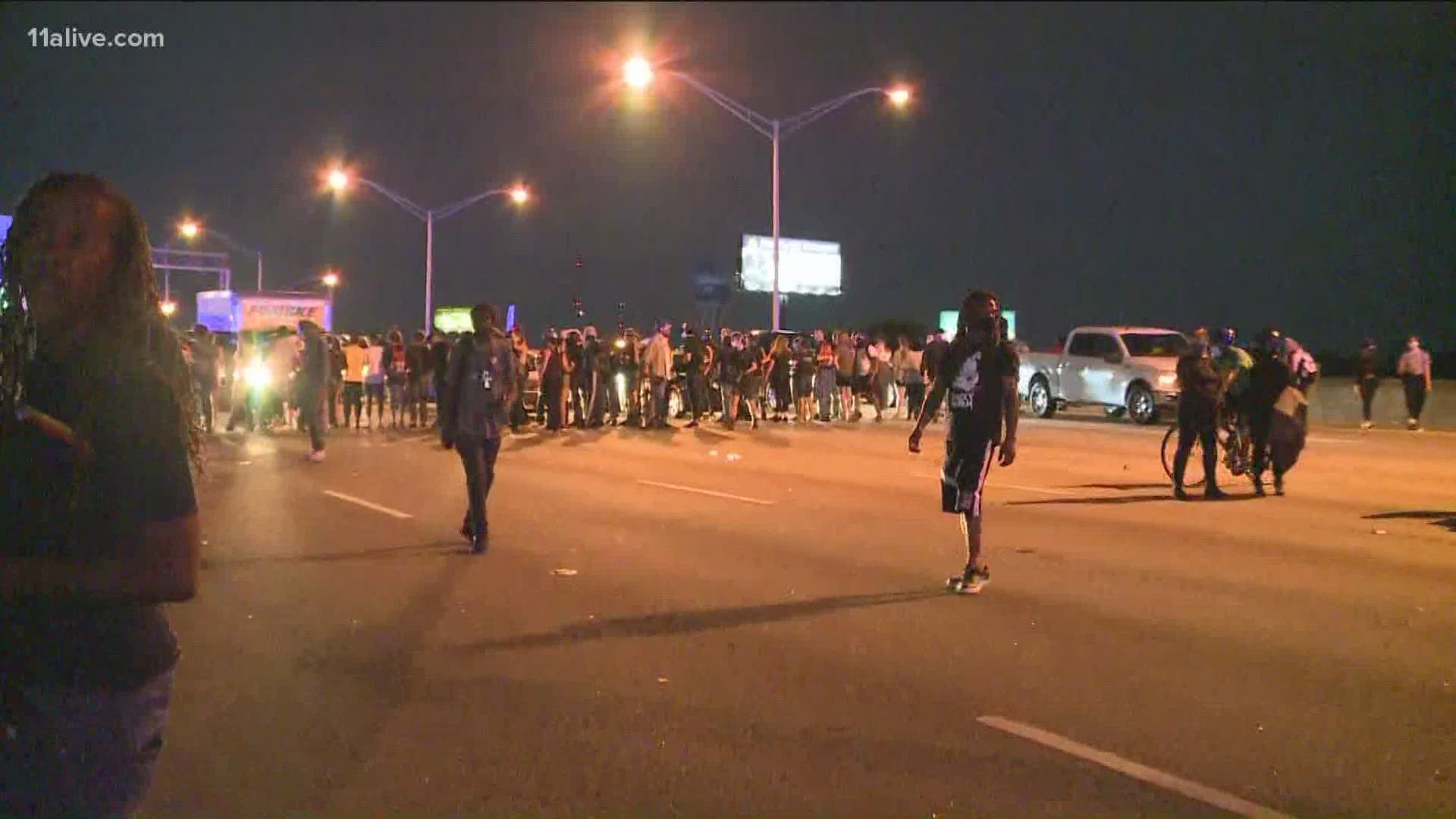 Saturday night protestors entered the downtown connector on I-75/I-85 and blocked all lanes of traffic near where a deadly officer-involved shooting happened.