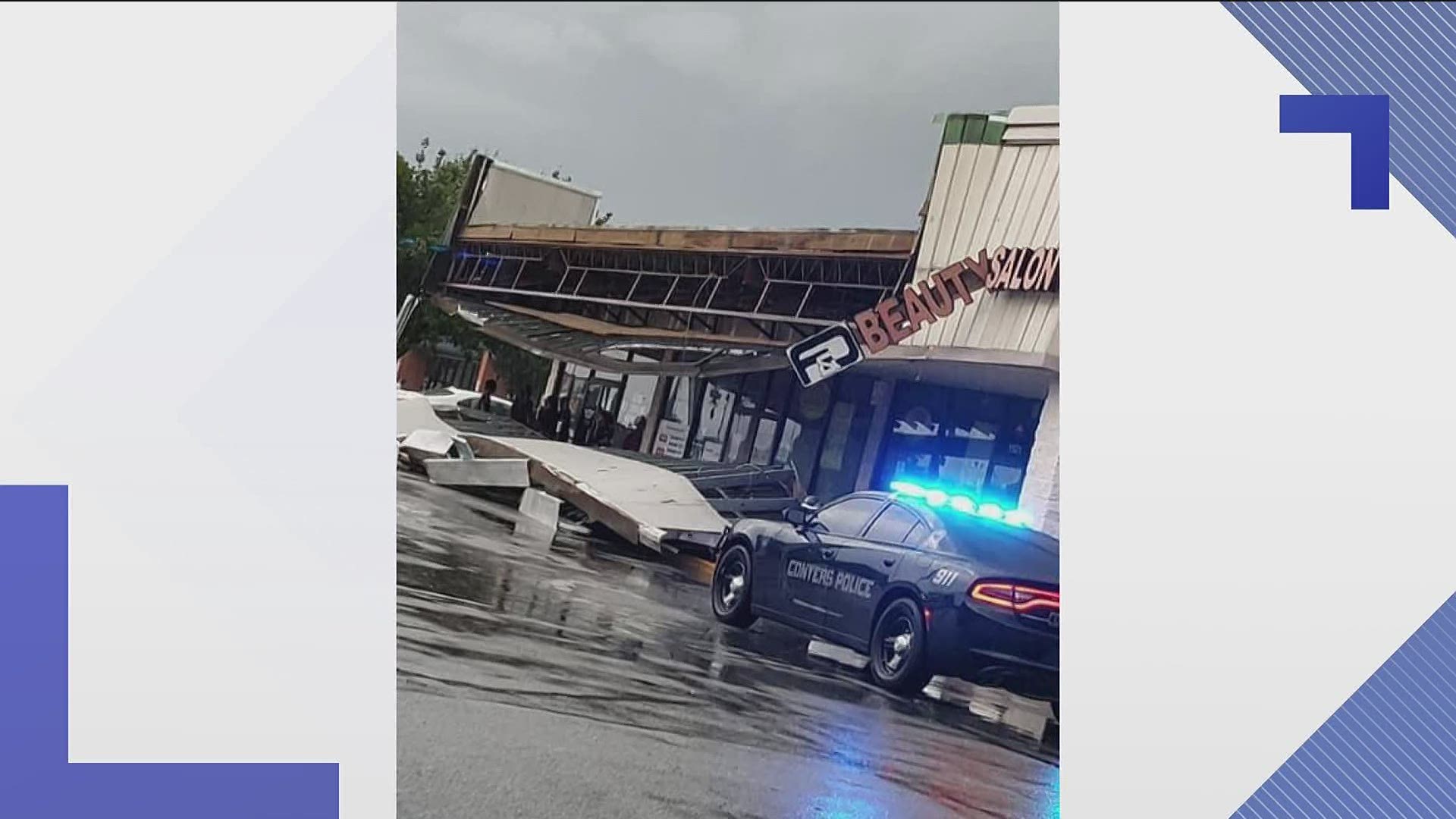 Heavy winds and rain hit the area bringing down trees and even the front's of businesses in Rockdale  County on Monday afternoon.