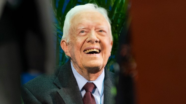 Jimmy Carter is walking, in 'good spirits' following brain surgery